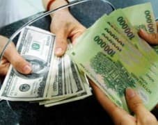 Ban hành qui định mới về tỷ giá mua bán ngoại tệ