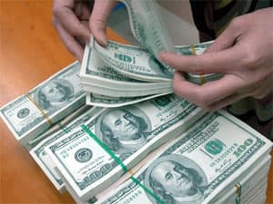 Mỹ: FED chấm dứt toàn bộ chương trình cứu trợ, giữ nguyên lãi suất thấp