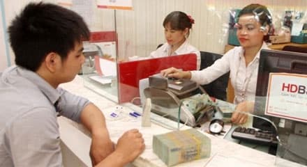 Trần lãi suất huy động giảm về 5,5%