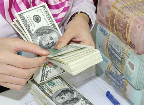 Tỷ giá VND/USD tăng 1% từ ngày 7-1