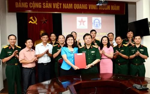 Tăng cường hợp tác giữa Báo Quân đội nhân dân và Viện Đại học Mở Hà Nội
