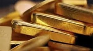 Giá vàng kết thúc phiên đầu tuần xuống dưới 1.710 USD/oz