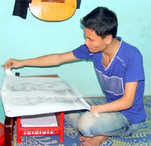 Ước mơ họa sĩ của chàng trai khuyết tật