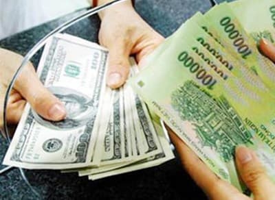 Điều chỉnh tỷ giá lên mức 21.036 VND/USD