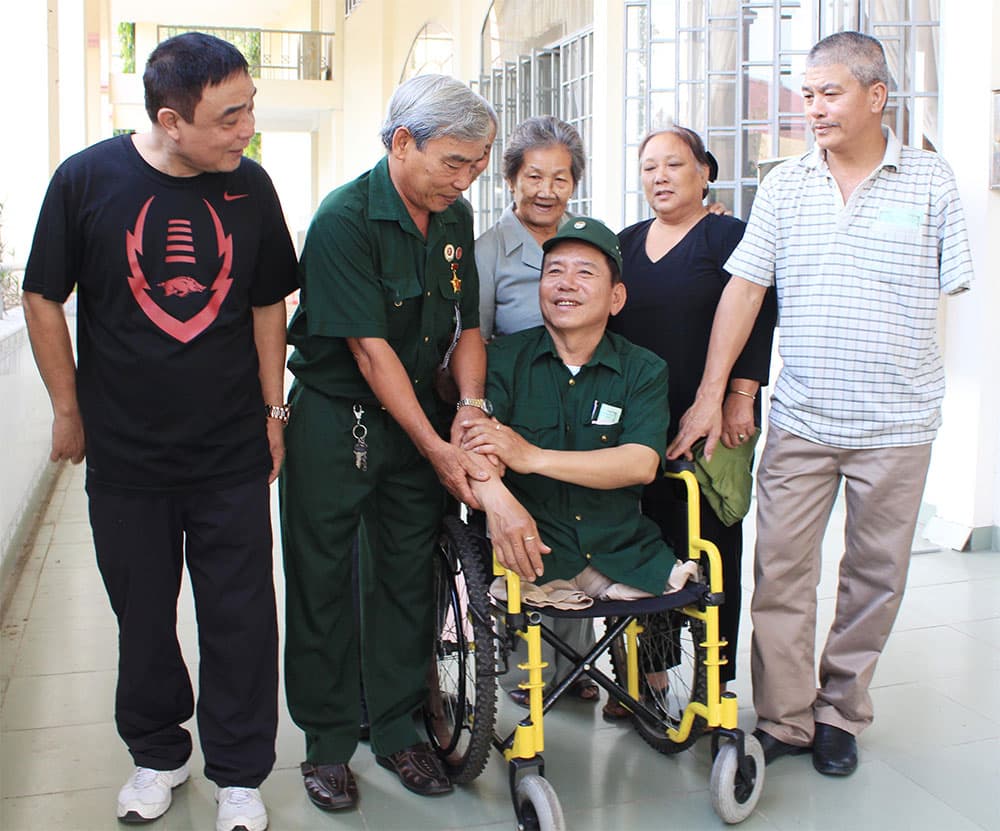 Giám đốc ngồi xe lăn và ký ức Pai-lin