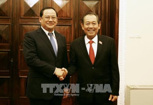 Phó Thủ tướng Thường trực Trương Hòa Bình hội đàm với Phó Thủ tướng Lào Sonexay Siphandone