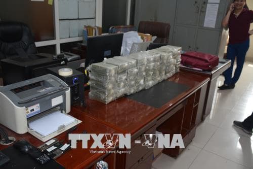 Bắt quả tang hai đối tượng vận chuyển trái phép 100 bánh heroin