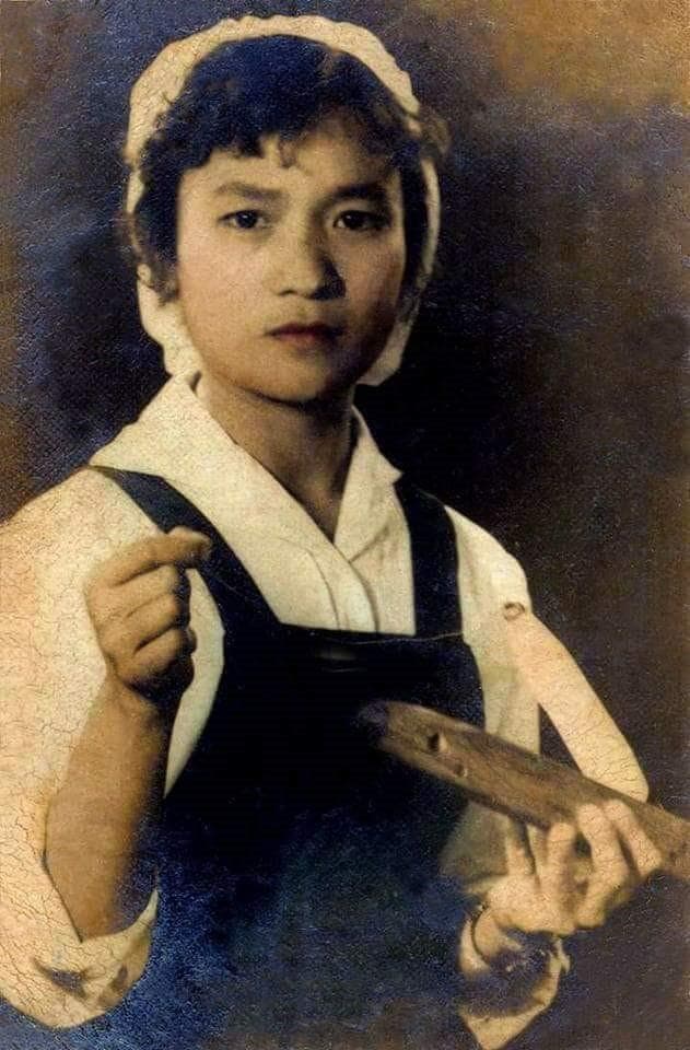 Tấm ảnh và bài thơ trong túi áo ngực