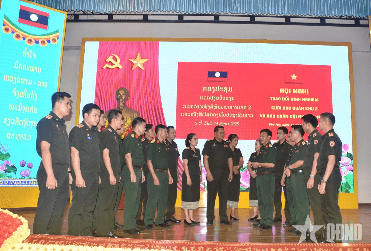 Trao đổi kinh nghiệm giữa Báo Quân khu 2 và Báo Quân đội nhân dân Lào