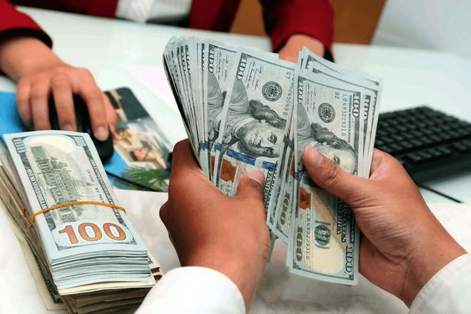 Tỷ giá USD hôm nay (13-11): Đồng USD biến động khi chính phủ Mỹ chuẩn bị mở cửa trở lại