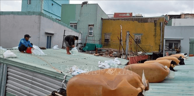 Bão số 15 giảm cấp, suy yếu dần